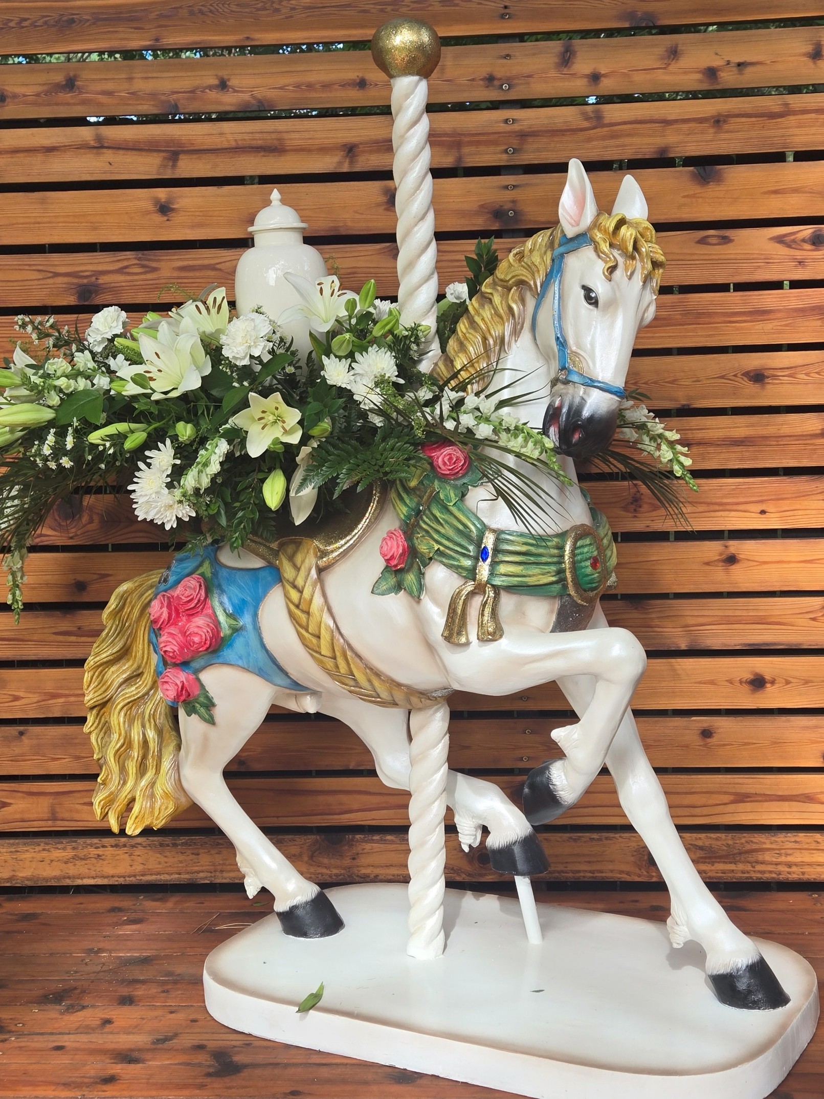 Floral carousel arrangement by Joseph Coffelt