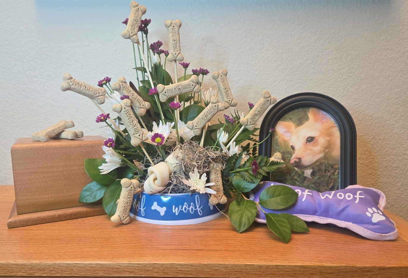 Pet tribute with treats and urn
